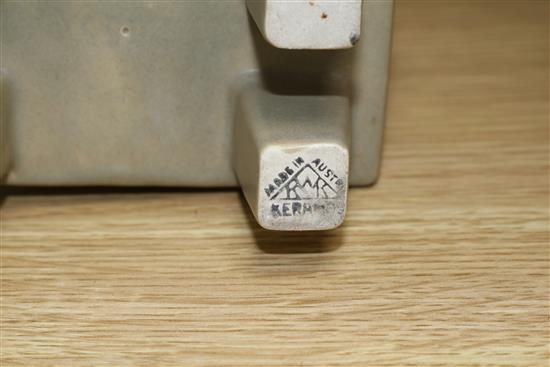 A Keramos figure of a seated girl